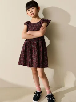 Next Smocked Frill Sleeve Dress (3-16yrs) Black Ditsy