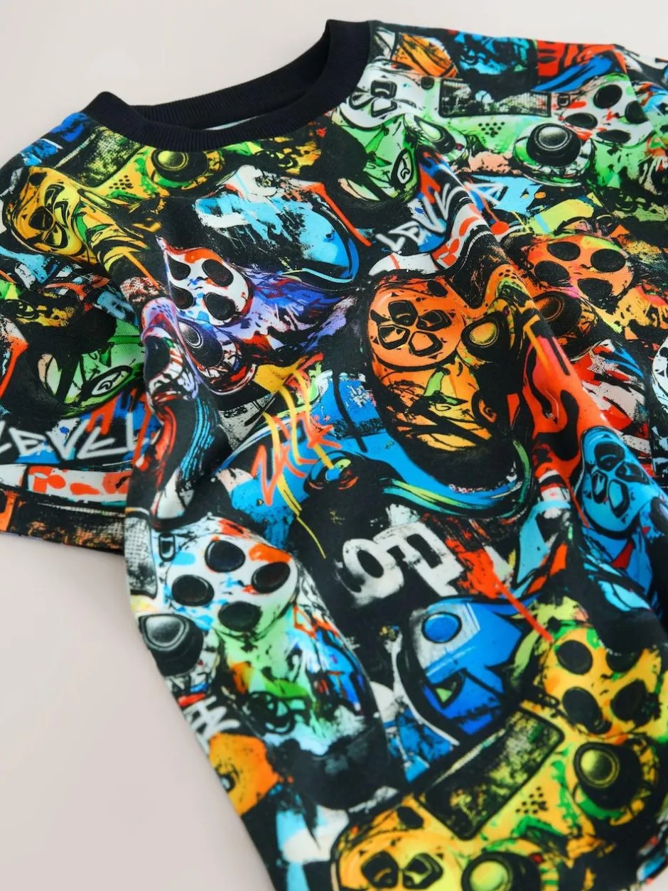 Next Relaxed Fit Short Sleeve All-Over Print T-Shirt (3-16yrs) Black Graffiti Controller