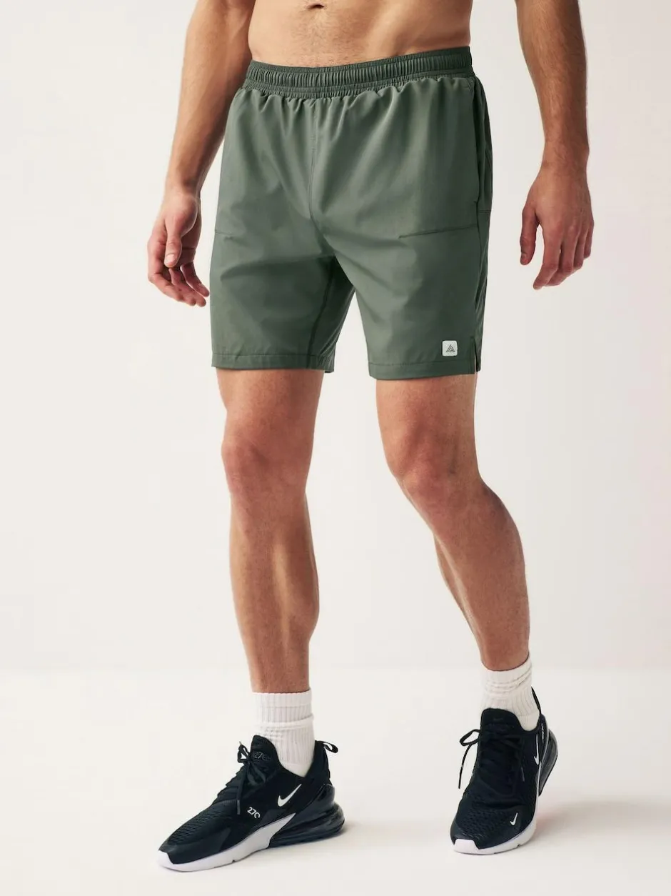 Next 7 Inch Active Gym Sports Shorts Khaki Green Online