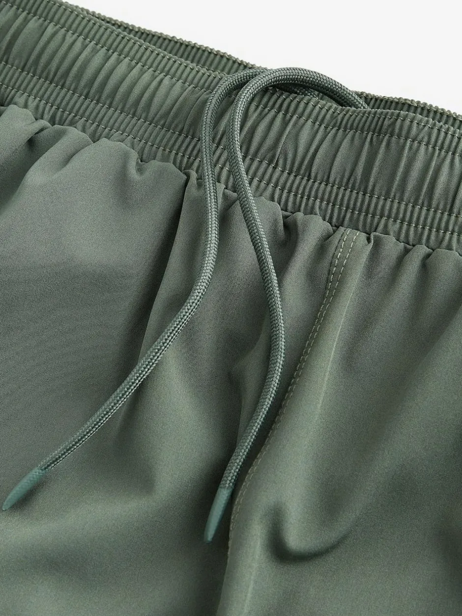 Next 7 Inch Active Gym Sports Shorts Khaki Green Online