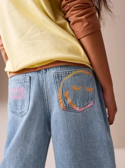 Next Mid Blue SmileyWorld® Print Wide Leg Jeans (3-16yrs) Online
