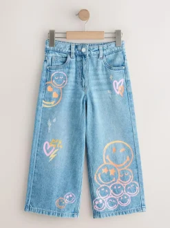 Next Mid Blue SmileyWorld® Print Wide Leg Jeans (3-16yrs) Online